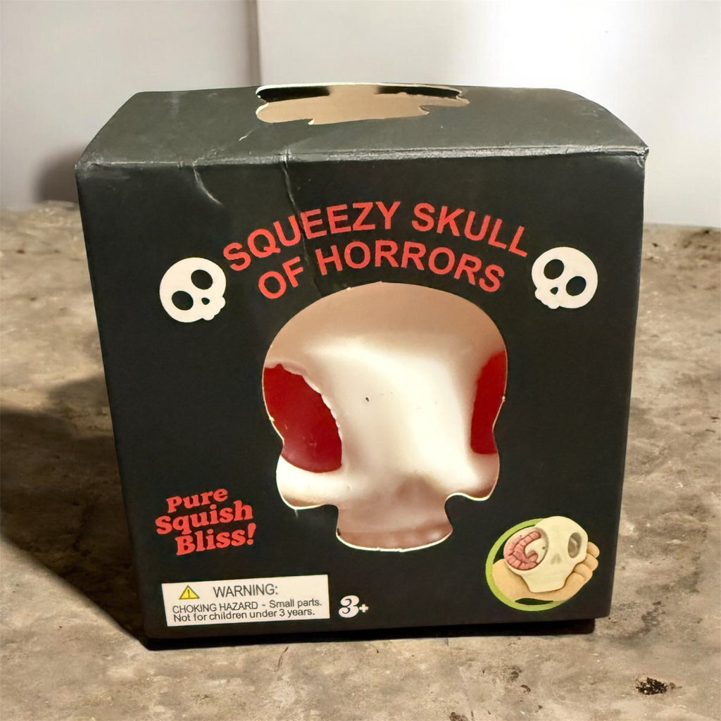 GLOW-IN-THE-DARK HORROR SKULL SQUISHY WITH SURPRISES